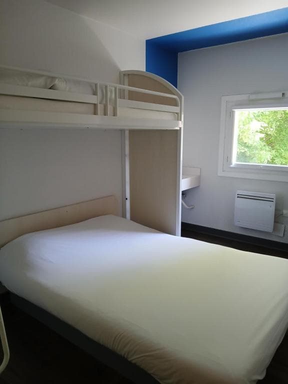 Double bed at budget Hotel F1 Douchy-les-Mines